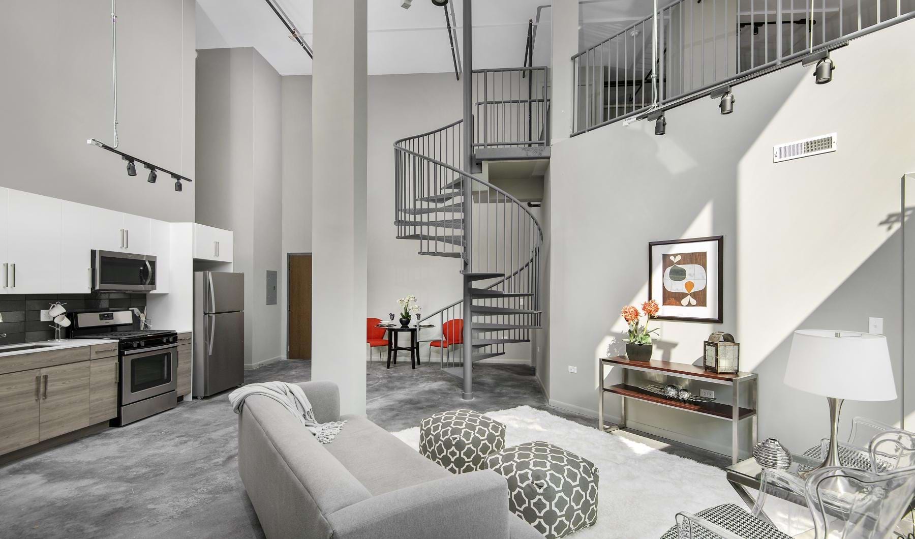 a living room with a staircase