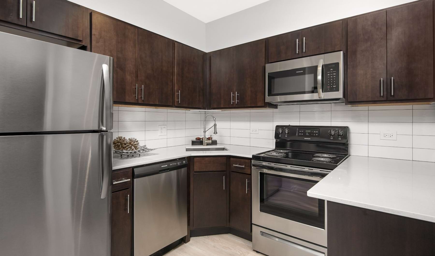 Open kitchen and living room with plenty of natural light.