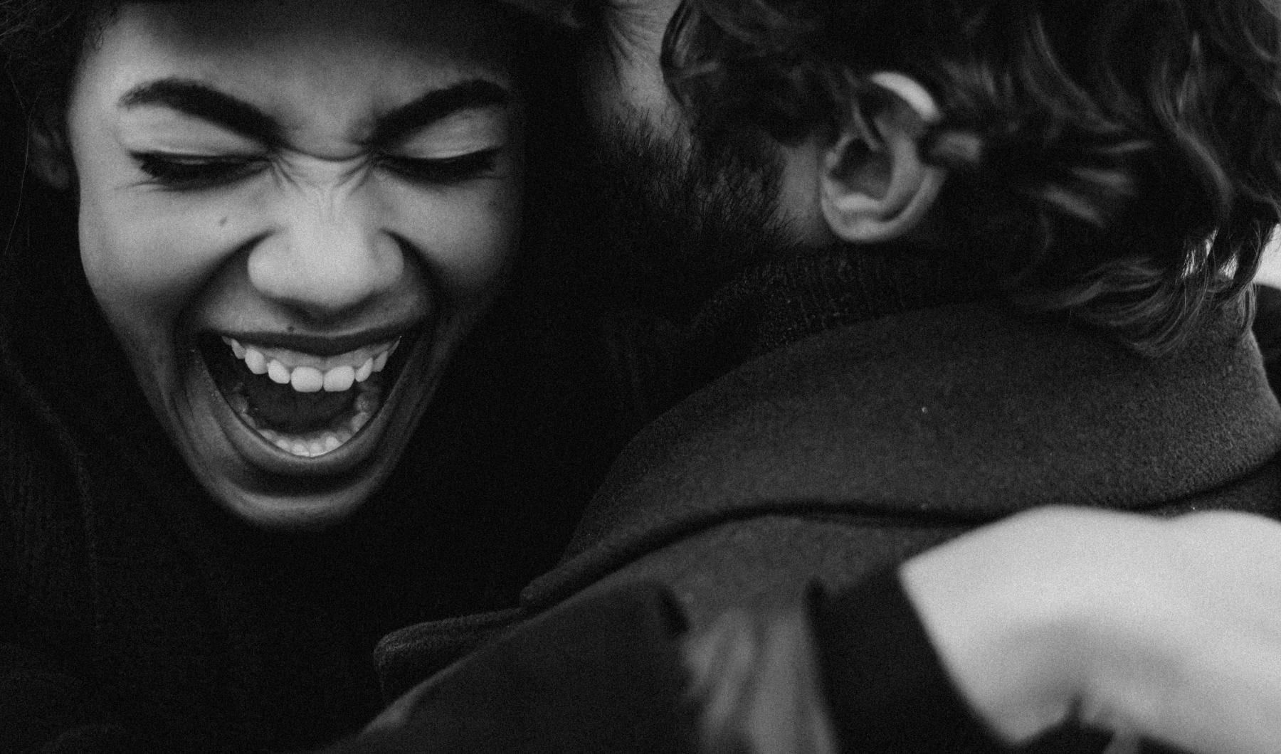 a man and woman laughing