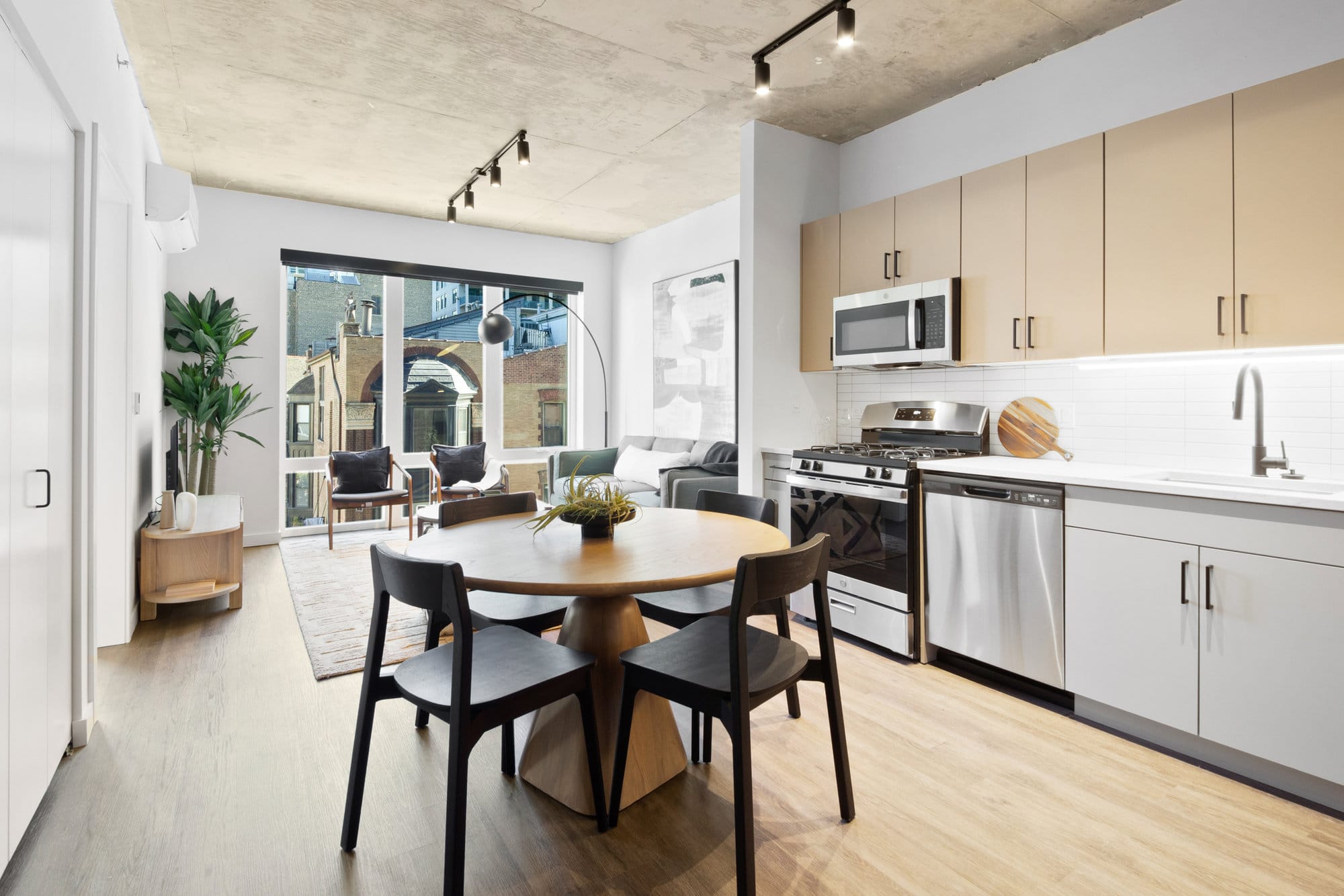 -MG-5901 Open-concept kitchen and living area in a Hugo apartment