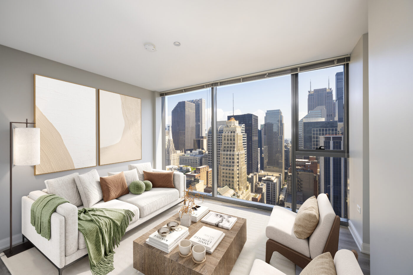 Living room with sofa, chairs, and coffee table and large window in a 1 bedroom apartment in Chicago at Lake & Wells